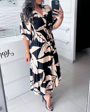 V-neck elegant dress with three-quarter sleeves